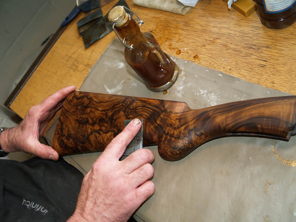 wood-being-rubbed-down-after-oil